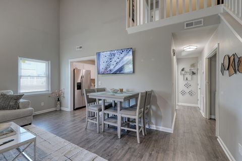 Living Room: Bright and airy retreat with modern decor, perfect for relaxation after beach adventures!