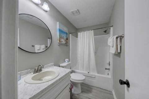 Bathroom: Bright, airy space with modern touches and beach-inspired decor for a refreshing stay!