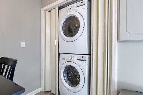 Laundry Room: Enjoy modern convenience with in-unit washer and dryer for easy beach attire cleanup!