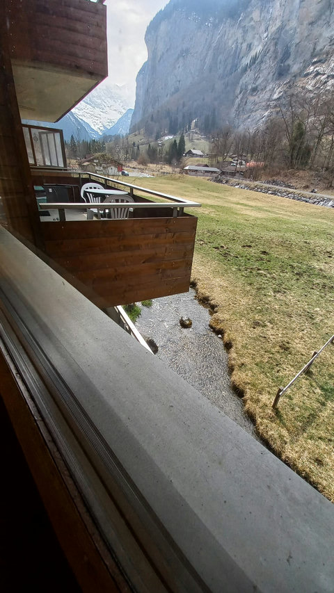 Balcony view up the valley - little brook below