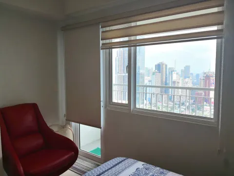 Bedroom opens to the balcony