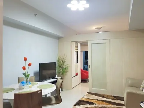 Open plan living area to bedroom