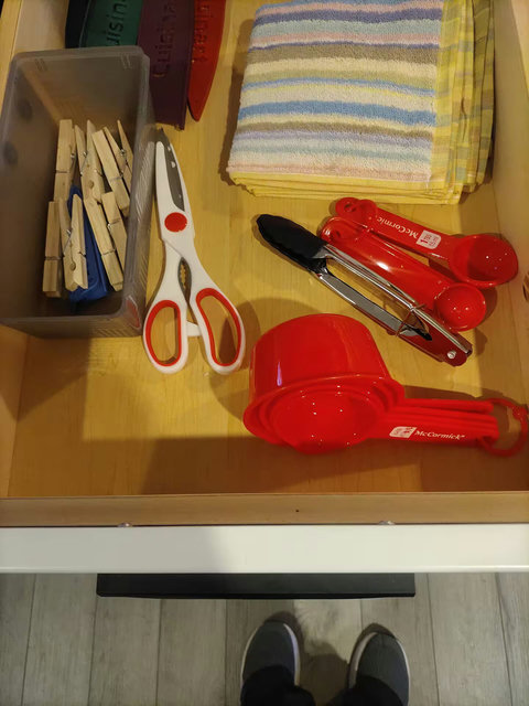 Well-stocked kitchen drawer with handy tools for easy meal prep