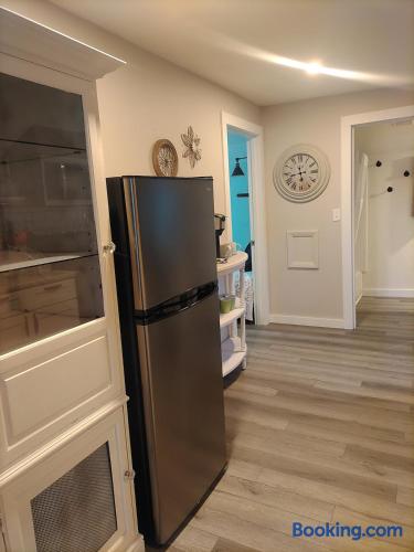 Clean, updated space with stainless fridge and easy room access