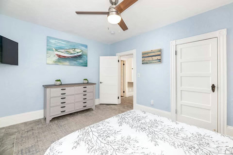 Upstairs Queen bedroom has a closet and plenty of dresser storage and a Roku TV too.