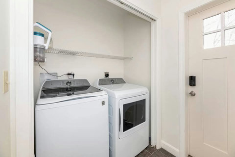 Downstairs laundry room. High capacity washer and dryer.