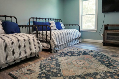 Yup, that's 2 trundle beds so that you can pull out the ones underneath for more sleeping capacity.