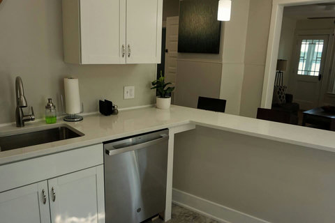 Soap, paper towels, bags, sponge, dishwasher pods.