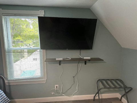 Just installed a larger 50" TV in the loft bedroom and added a shelf for your gaming system or other electronics.  