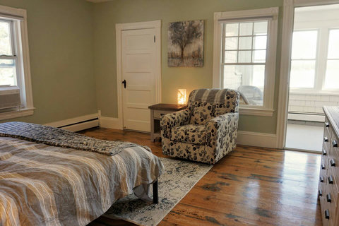 King bedroom with super quiet AC and easy access to the views from the sunroom! Huge closet!!