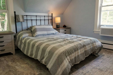 Queen bed sits a little low for those who prefer that but there is still some room under the bed for storage.