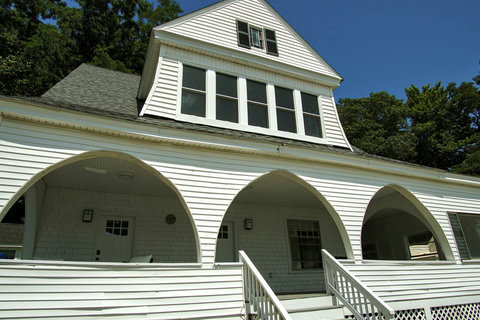 Huge covered porch. Room for multiple seating areas and even a dining table and chair set.