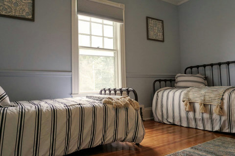 Very comfortable Ashley mattresses even on the twin beds. Not shown but there's a Roku TV and super quiet AC and fan in this bedroom just like the Queen bedroom.