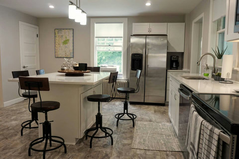 There's the coffee nook over there in the right corner beside the big refrigerator.