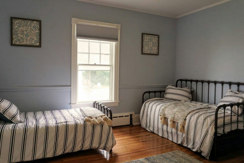 A twin and a trundle with bed under that will raise to regular height. Big room lets you stretch out and move bed to wherever is comfortable.