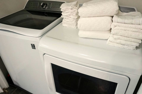 Keeping it clean with brand new washer and dryer set for your convenience.