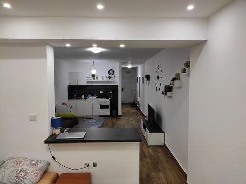 View from balcony (living room, kitchen, hallway)