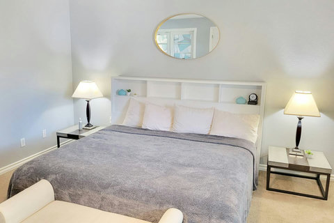High end King Memory Foam bed and quality pillows and linens.