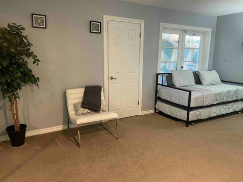 This door is the bathroom. 
Please remove shoes all the times in carpet area. 