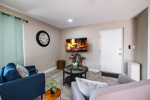 Comfy living room seating to enjoy your hearts desire on the 55" smart tv.