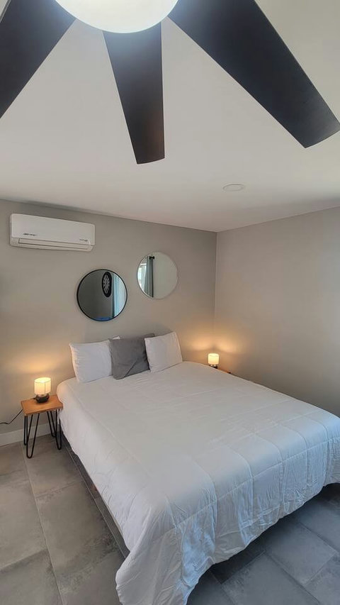 Large ceiling fan and ductless HVAC system to keep the temperature comfortable at your desired settings.
