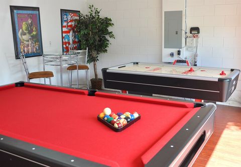 Enjoy your very own games room with slate pool table and full size air hockey!