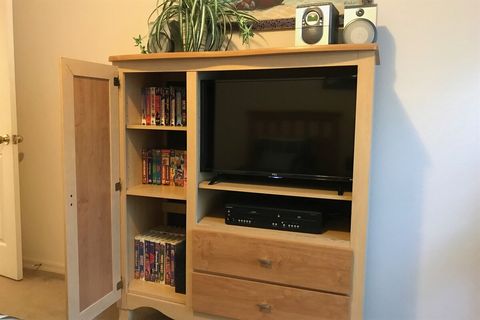 ... AND a brand new (Nov/17) 32" TV with VCR/DVD player, stereo & video library!