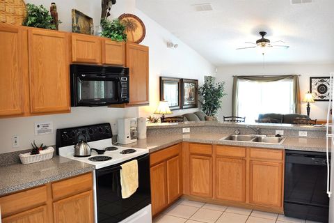 The spacious Kitchen has quality full-size appliances and lots of counter space.