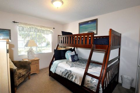 The 2nd Bedroom at the front of the home features a twin/double bunk combination