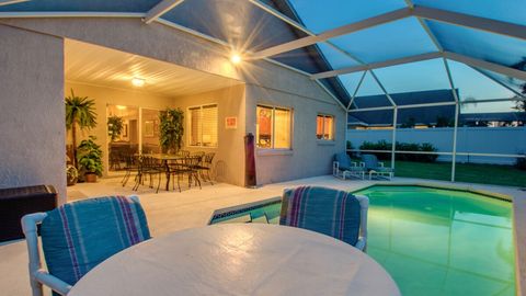 The lanai, pool enclosure and underwater pool lighting beckon you to enjoy the outdoors, even at night!