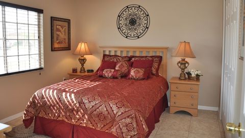 The queen bedroom at the front of the home. Note that furniture has been recently upgraded in this room (new photo coming soon).