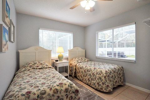 Back bedroom features two twin beds with dreamy soft mattresses.