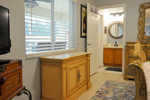 The master ensuite bath has direct access to the pool.