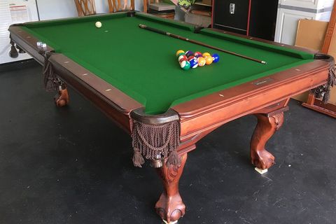 Enjoy a quality slate full-size pool table in the games room.