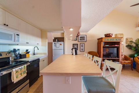 Side view of kitchen.  Nice sets of knives, coffee maker, and plenty of cooking utensils for you to prepare meals when you aren't eating amazing St. Croix cuisines!