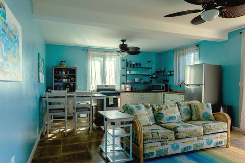 Full Kitchen and Living Room with TV