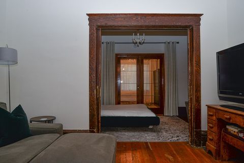 View from living room in to den and the bedroom past the den.