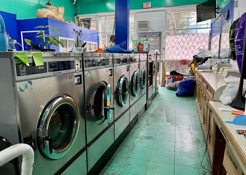 Spin Cycle Laundry Mat - 1910 Commercial Drive