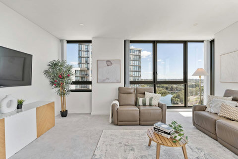 Stretch out and relax in the spacious lounge while enjoying natural light and sweeping district views.