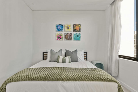 Thoughtfully styled for comfort, this inviting bedroom offers a restful space to unwind after a day of exploring.