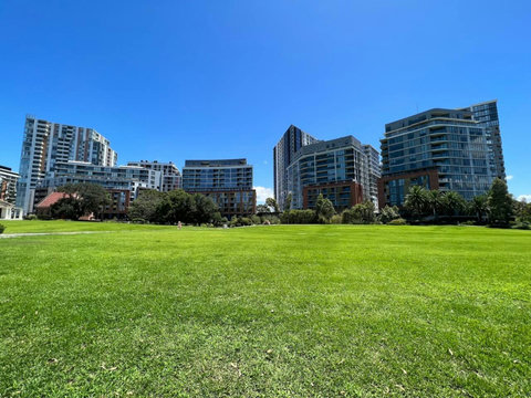 Relax, picnic, or play in the expansive community park surrounded by modern waterfront living.