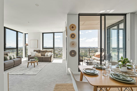 Bright open-plan living combines stylish interiors with stunning views and effortless indoor-outdoor living.
