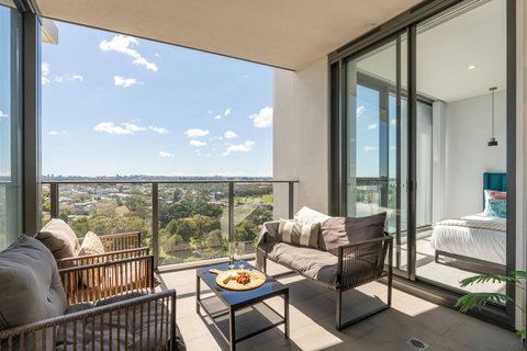 Unwind with morning coffee or sunset drinks on the spacious balcony overlooking Sydney's stunning skyline and parklands.