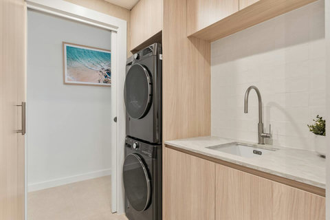 Dedicated laundry with washer, dryer and everything needed for convenient longer stays.