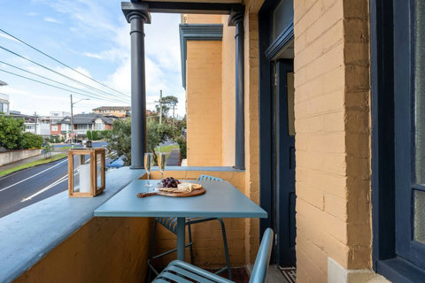 Private Balcony | Settle in with a drink and enjoy a peaceful moment outdoors