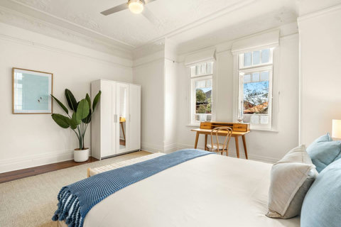 Fresh linens, soft colours and natural light create a serene bedroom retreat