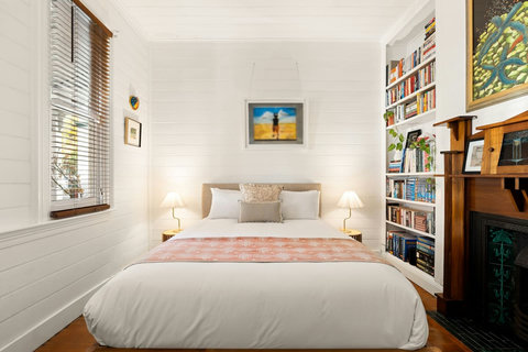 Third queen bedroom with character details and artwork