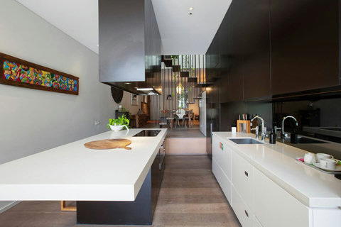 Sleek galley-style kitchen with ample preparation space and plenty of storage