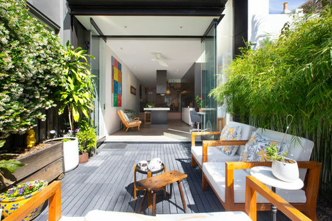 The landscaped courtyard offers a sunny outdoor space for morning coffee, drinks or a quiet afternoon