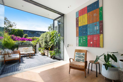 Indoor and outdoor spaces connect seamlessly, opening the home to the private rear courtyard